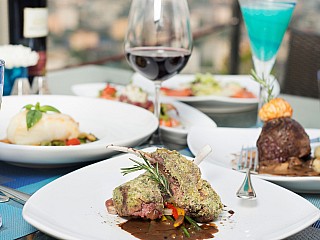 Bush herbs crust lamb rack With Kenya beans, capsicum and borletti beans with three peppercorn sauce