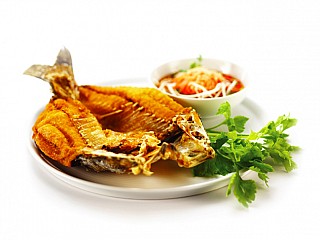 Deep Fried Seabass in Fish Sauce  served with Mango Salad