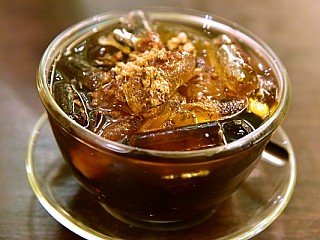 Grass Jelly with Longan and Ginko served with Sugar Cane