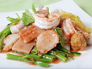 ยำเย็นตาโฟทะเลทรงเครื่อง/Yum Yen Ta Foh luxury seafood. Variety of seafood with tomato sauce tossed in Yum style