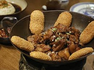 Baby Rooster Stew with Crispy Sesame Bun