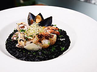 Squid Ink Risotto With Seafood .