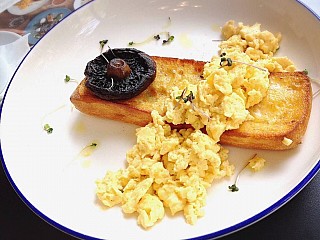 Truffle Infused Scrambled Eggs with Roasted Portobello Mushroom