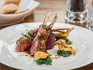 Roasted Lamb Rack with Meaux Mustard, Artichokes, Baby Spinach & Pecorino Cheese Sauce