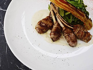 Lamb Chops with Guanciale, Potato Cream and Rucola Salad