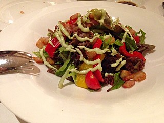 Mixed Green Salad with Tuscan Bacon from Lenzi’s Farm topped with Roasted Bell peppers and Garlic
