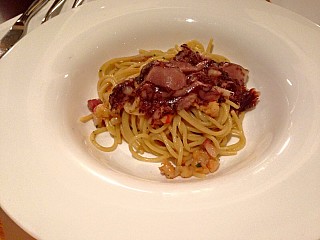 Lenzi’s Spaghetti with Pork Belly Ham and Tiger Prawns topped with A slice of Blood Pudding Ham