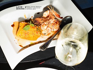 Egg net wrap With marinated white shrimp and crispy soft crab shell, tamarind sauce, Thai pesto